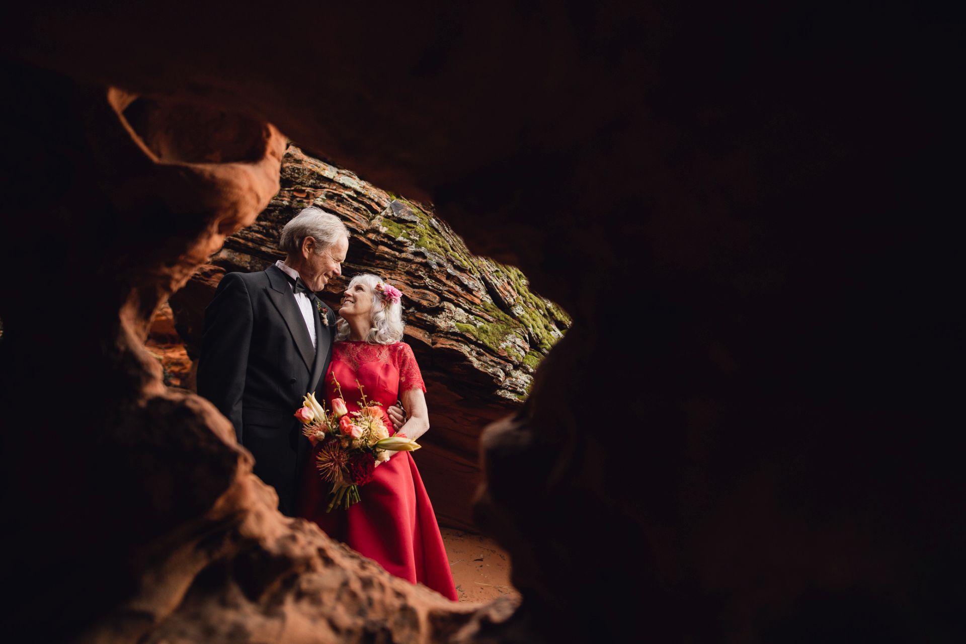 adventure wedding in the utah desert - couple photographed in spectacular cave