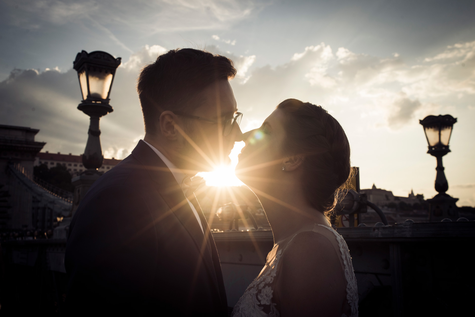 Elopement and honeymoon in Budapest - romantic elopement location in Europe, couple kissing in sunset