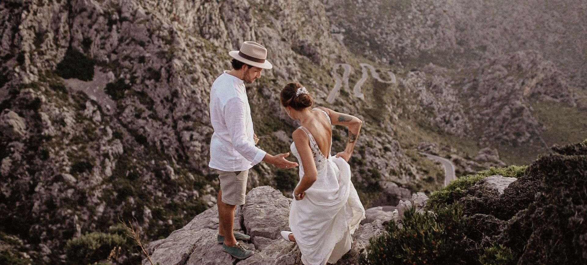 mallorca elopement wedding -wedding day with bride and groom hiking in Tramutana mountains