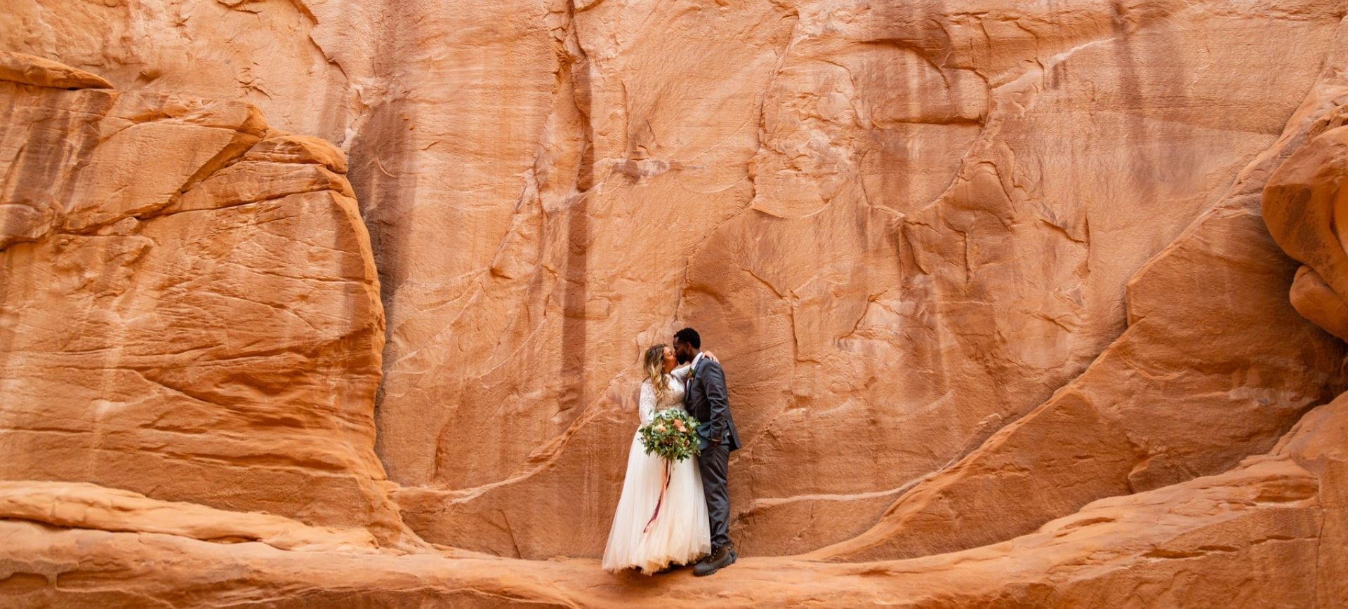elopement in moab - adventure wedding in moab desert