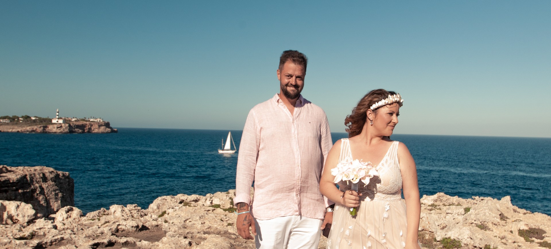 Portoclom Elopement in Mallorca - Bride & Groom at their beach wedding