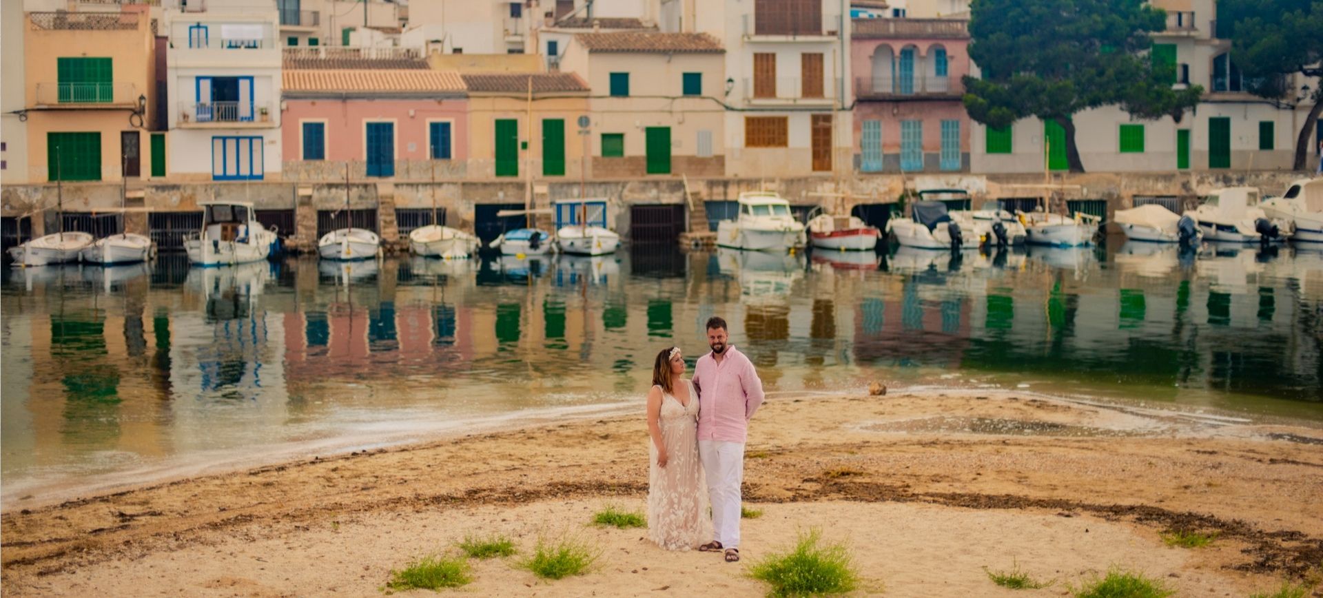 Town Elopement in Mallorca Portocolom - Bride and Groom posing on their wedding day
