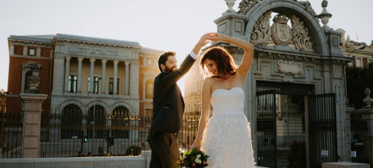 city elopement in Madrid - bride and groom dance during sunset