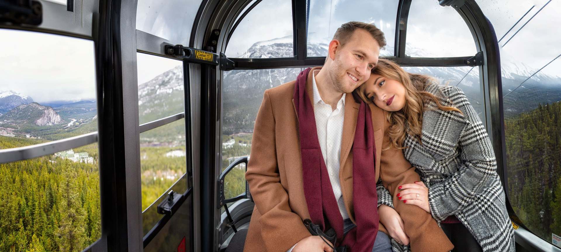 Banff Proposal with Mountain Views & Gondola-Ride - recently engaged couple in Banff gondola